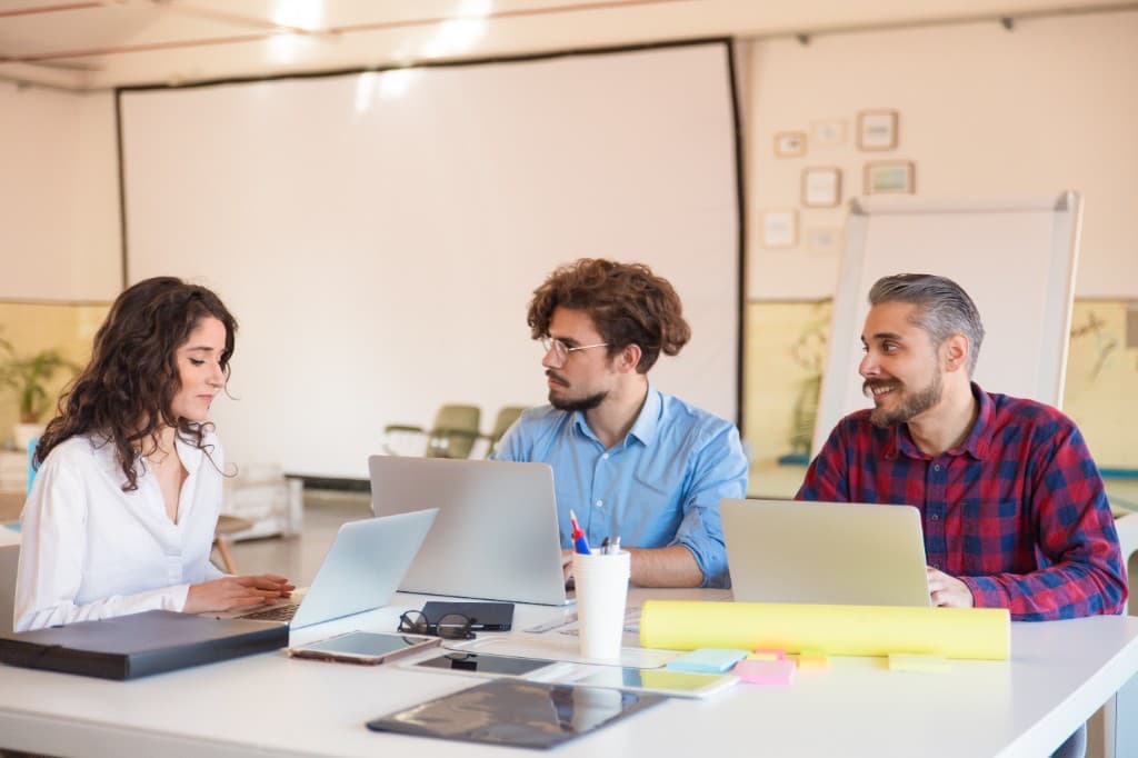 Business team reviewing service plans